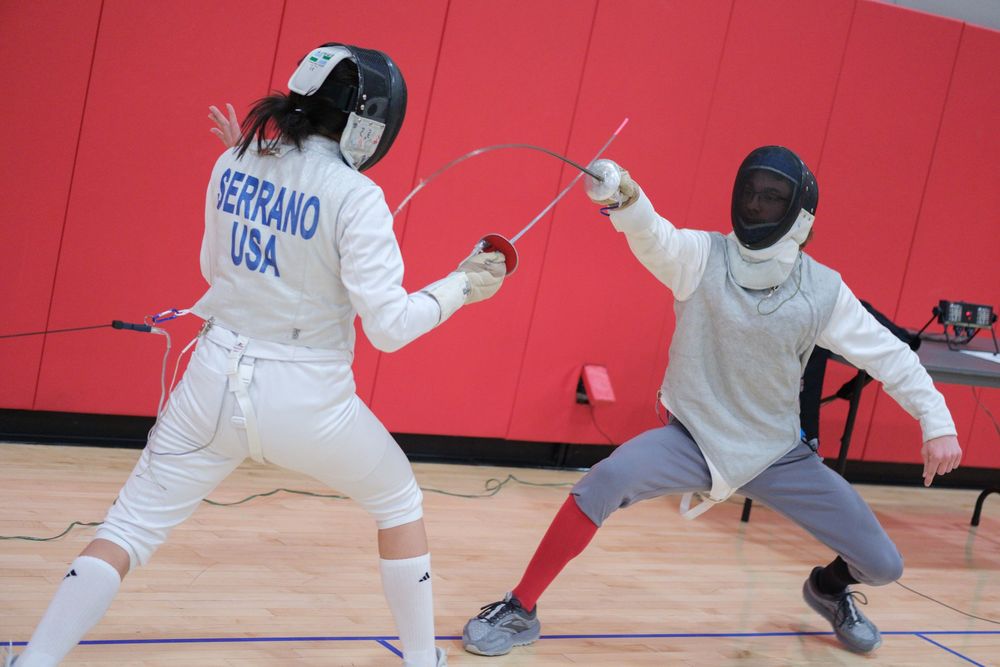 Members of the Fencing Club at Northern Illinois University in Dekalb, IL participate in a fencing tournament against other schools.