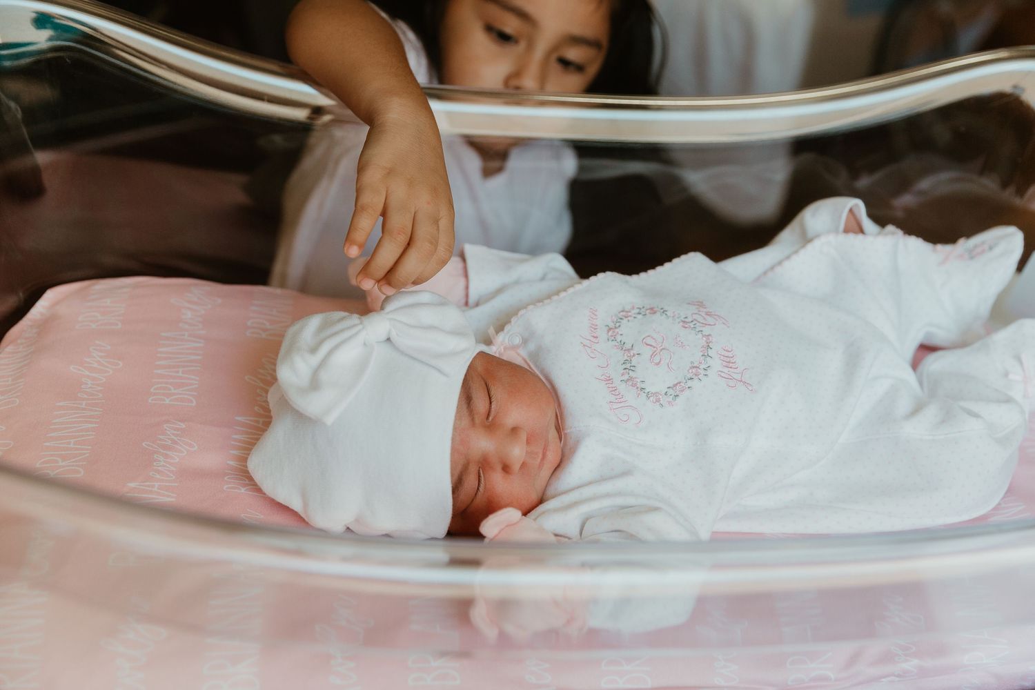 Sibling meets new baby during Fresh 48 session Tyler tx