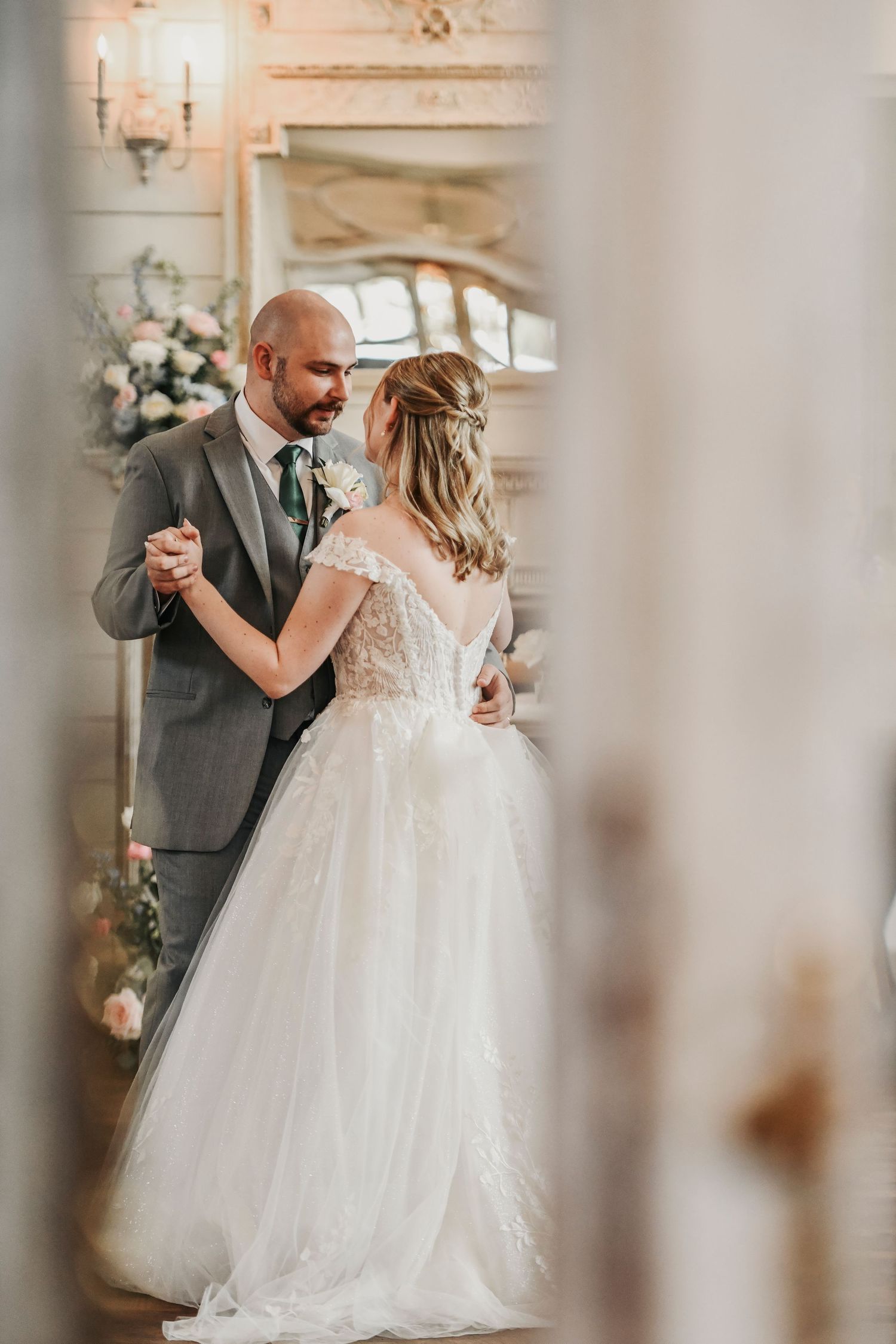 Candid bride and groom first dance photographed at The French Farmhouse
