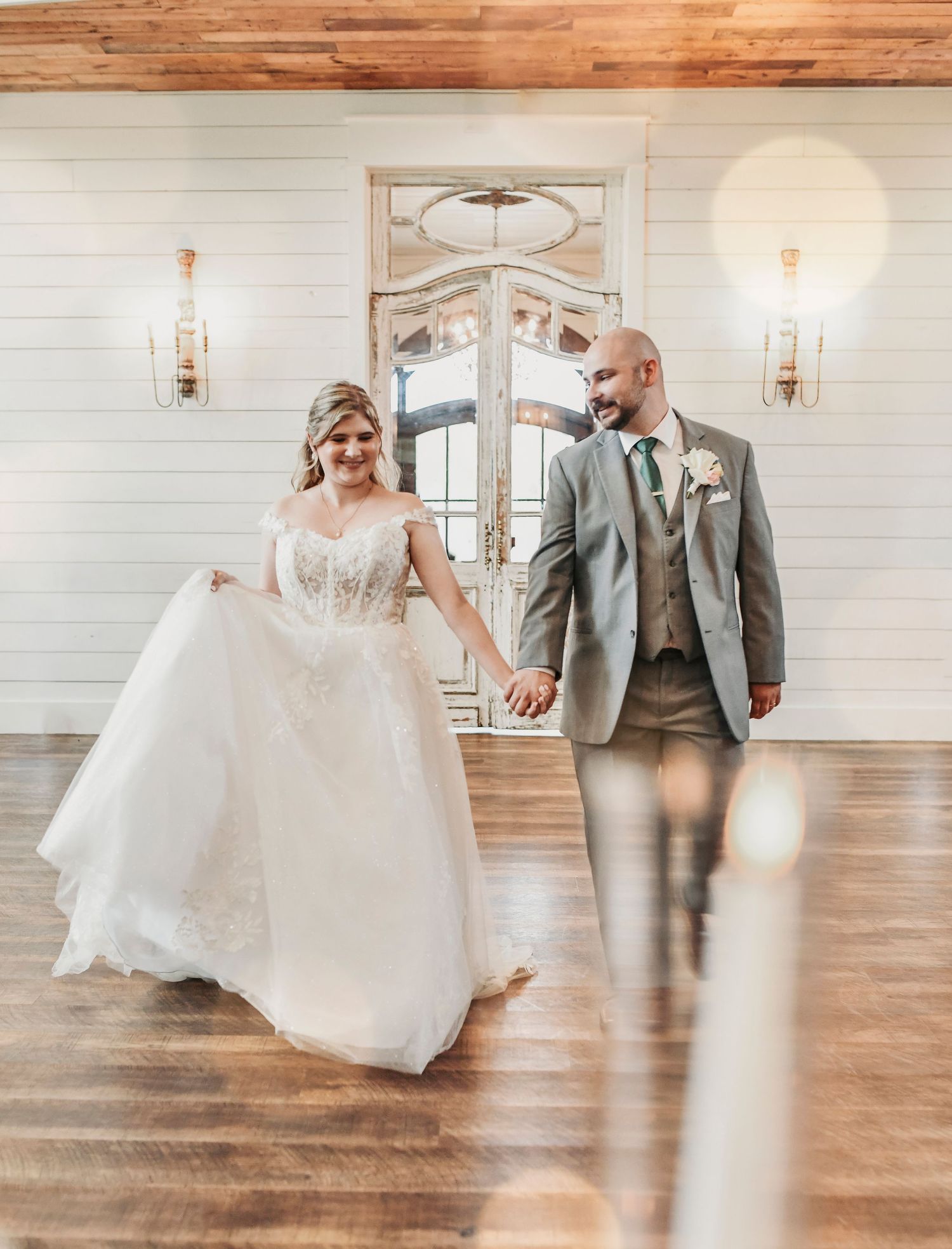 Parker and Kathryn making their grand entrance into their French Farmhouse wedding reception