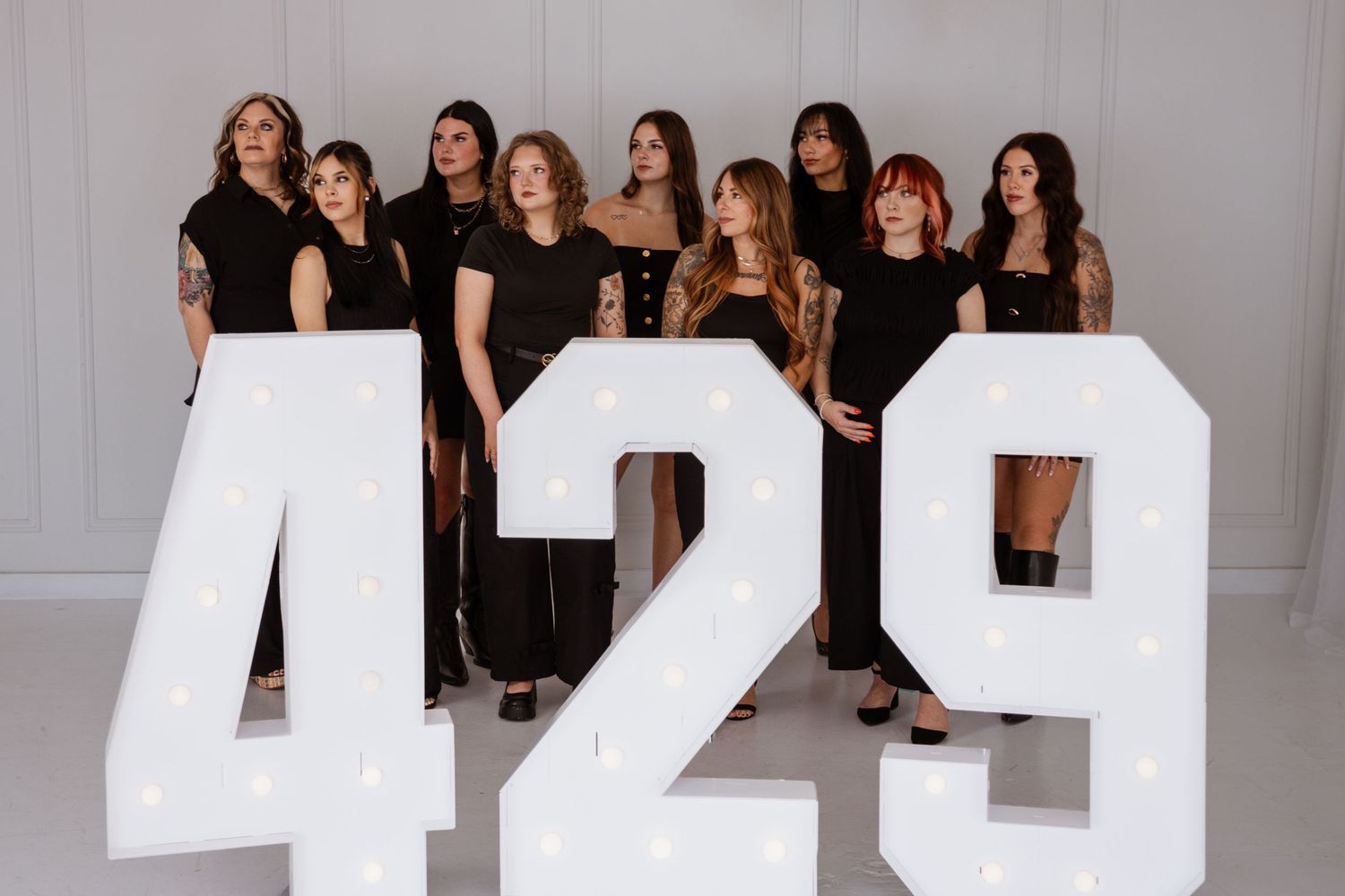 Group of women posing together during a professional business branding photography session in Oklahoma City.