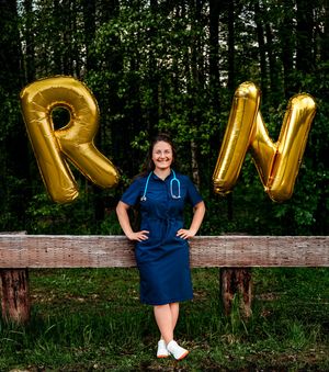A series of four photos showing someone in a navy dress posing with gold letter balloons against a wooded backdrop.