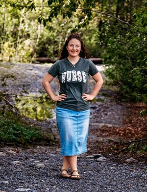 A series of outdoor portraits showing someone in a denim skirt and casual top standing on a wooded path.