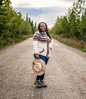 A sequence of photos shows a person crouching down to examine something on a gravel road surrounded by trees.