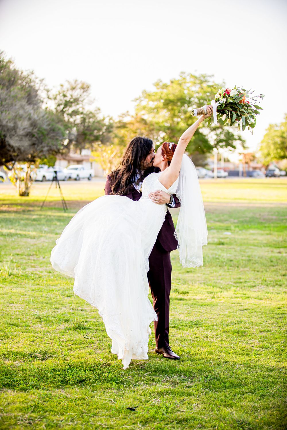 Bride and groom formal portraits at Album Park in El Paso, TX – Vibrant, colorful outdoor photos at midday.