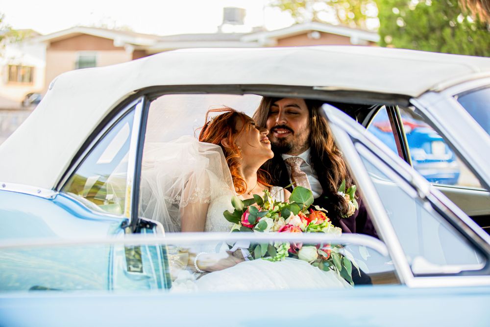 Formal portraits with groom’s classic Mustang car in El Paso, TX – Bride and groom posing beside the stylish vintage car.