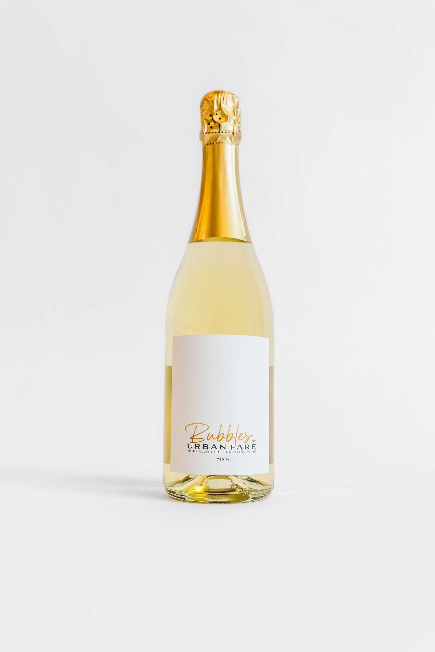 Product photography of a wine bottle taken on a white background by a Kelowna photographer