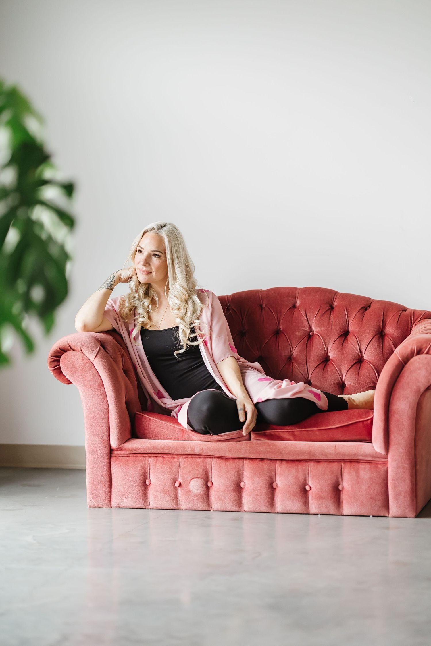 Studio photography done by a local Kelowna photographer for a branding lifestyle photoshoot on a couch with white walls
