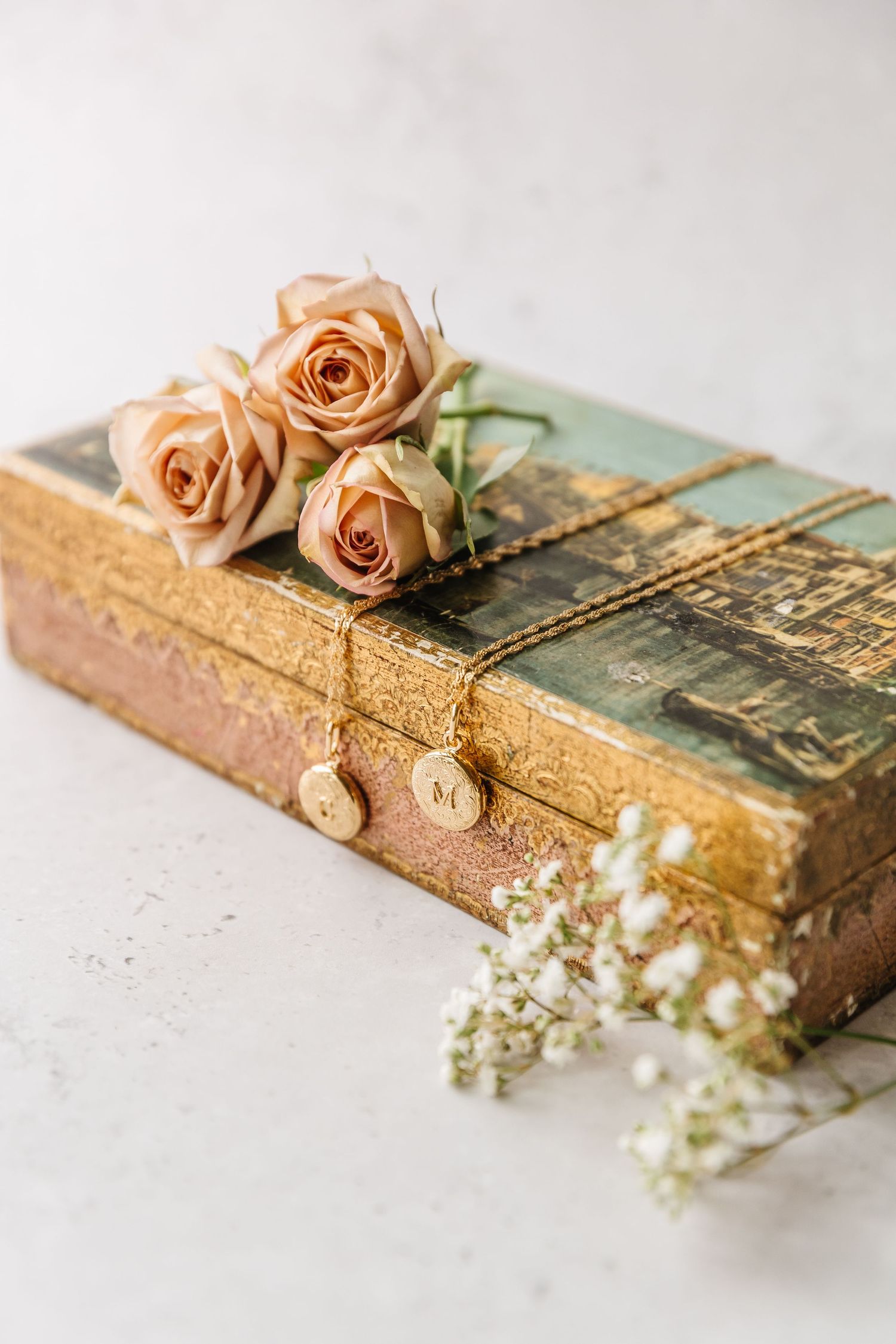 Close up of a gold necklace during a lifestyle branding photoshoot in Kelowna, BC