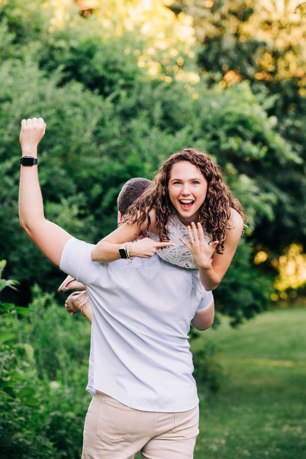 A joyful sequence of someone in a white shirt and khaki pants dancing and celebrating in a sunny garden setting.