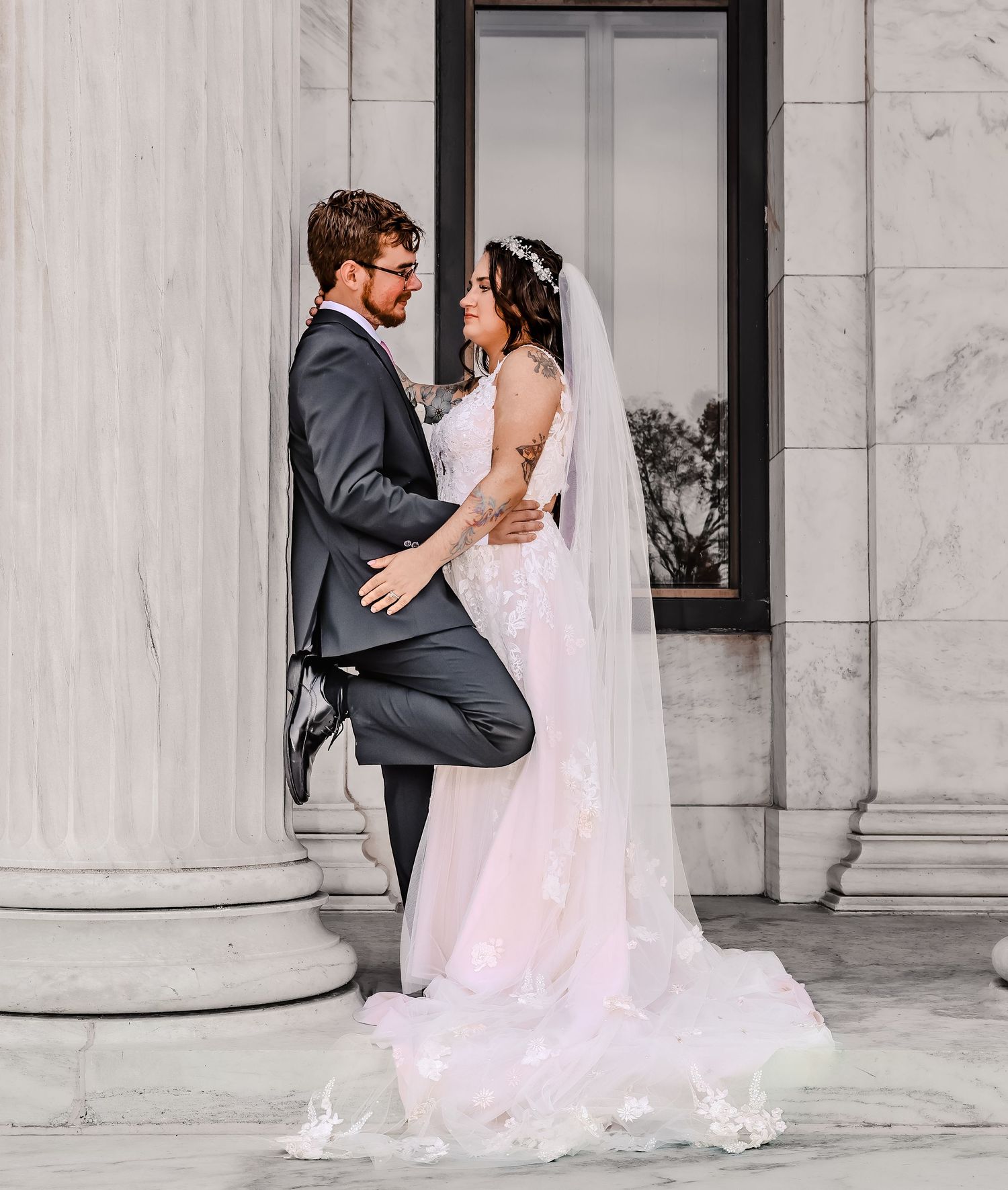Romantic wedding photography sequence against white marble architectural backdrop.