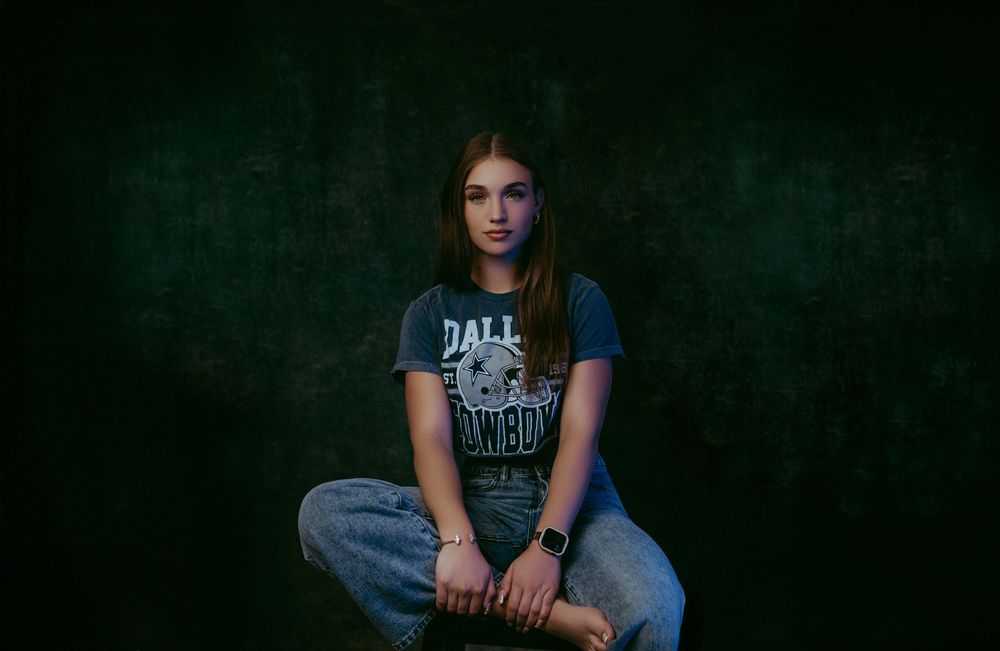 Modern senior studio photos featuring bold posing and a luxury aesthetic