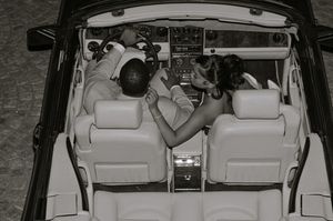 A sequence of interior car photos showing the folding and storage of rear seats in a silver SUV or minivan.