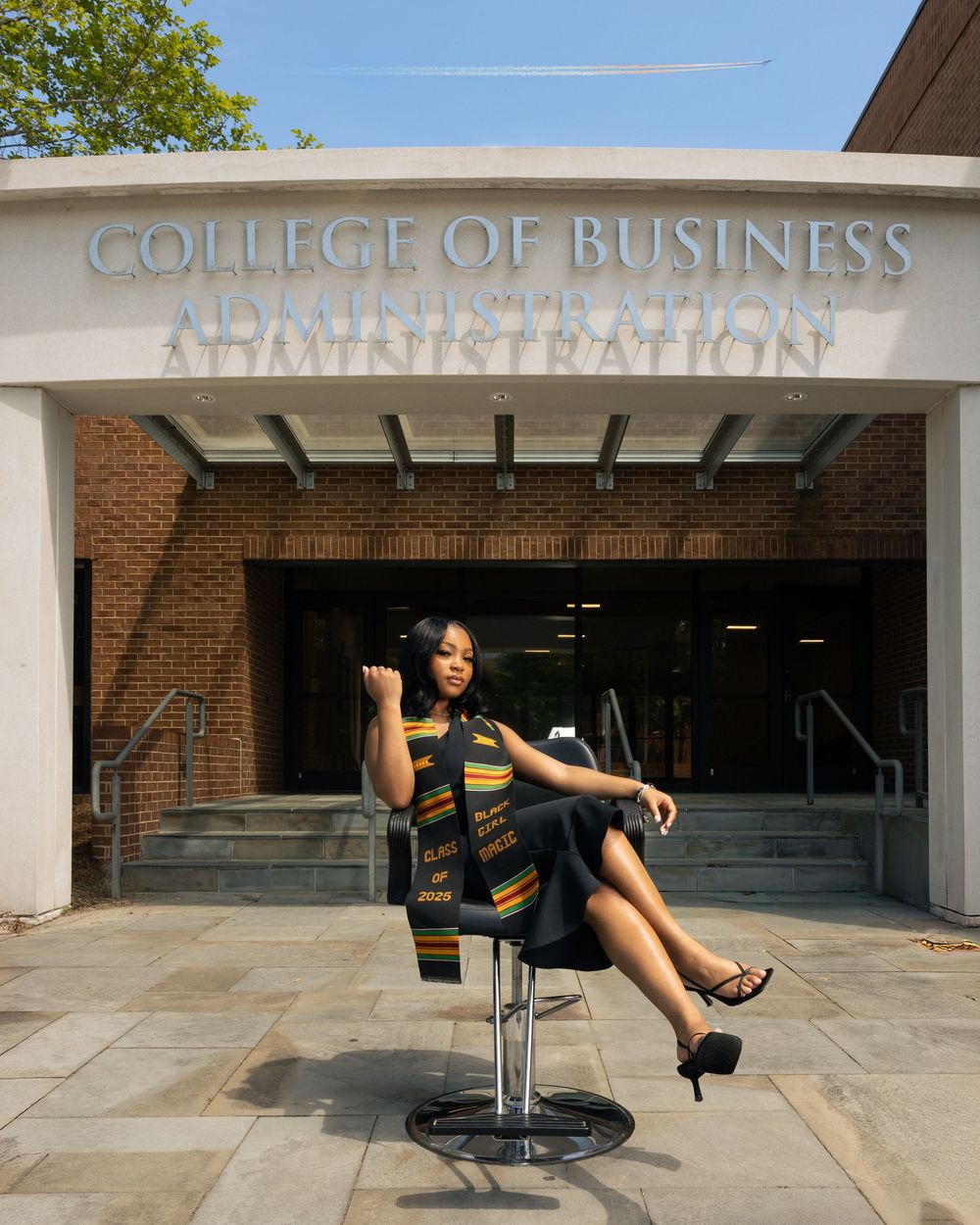 A sequence of photos showing a person in black clothing performing acrobatic poses on a chair outside a college building.