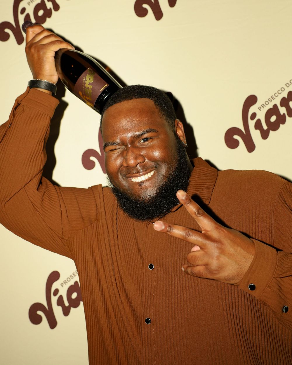 A sequence of five photos showing a person in a brown shirt making expressive poses against a beige background.
