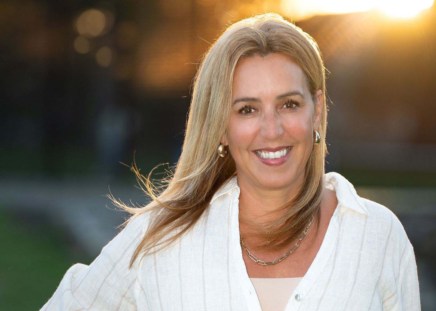 Outdoor portrait series at golden hour in white outfit.