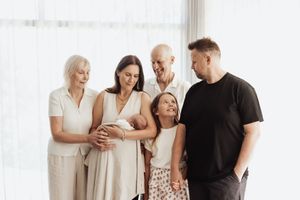 A collection of minimalist family portraits against a white background showing tender moments and interactions.