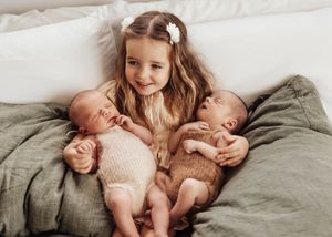 A series of candid lifestyle photos showing siblings bonding together on a cozy gray couch.