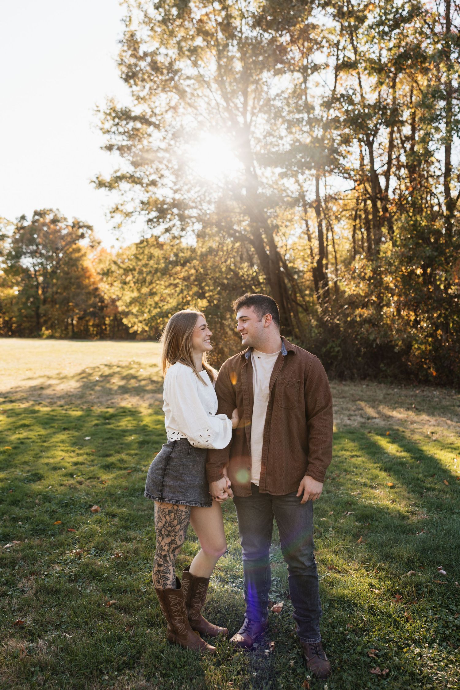 Romantic couple winter engagement photos in downtown Cuyahoga Falls and Akron, Ohio JENKS building and Yada Yada Coffee in Northeast Ohio.