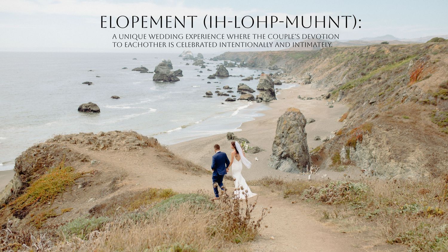 A bride and groom walk on a coastal cliff as they celebrate their elopement
