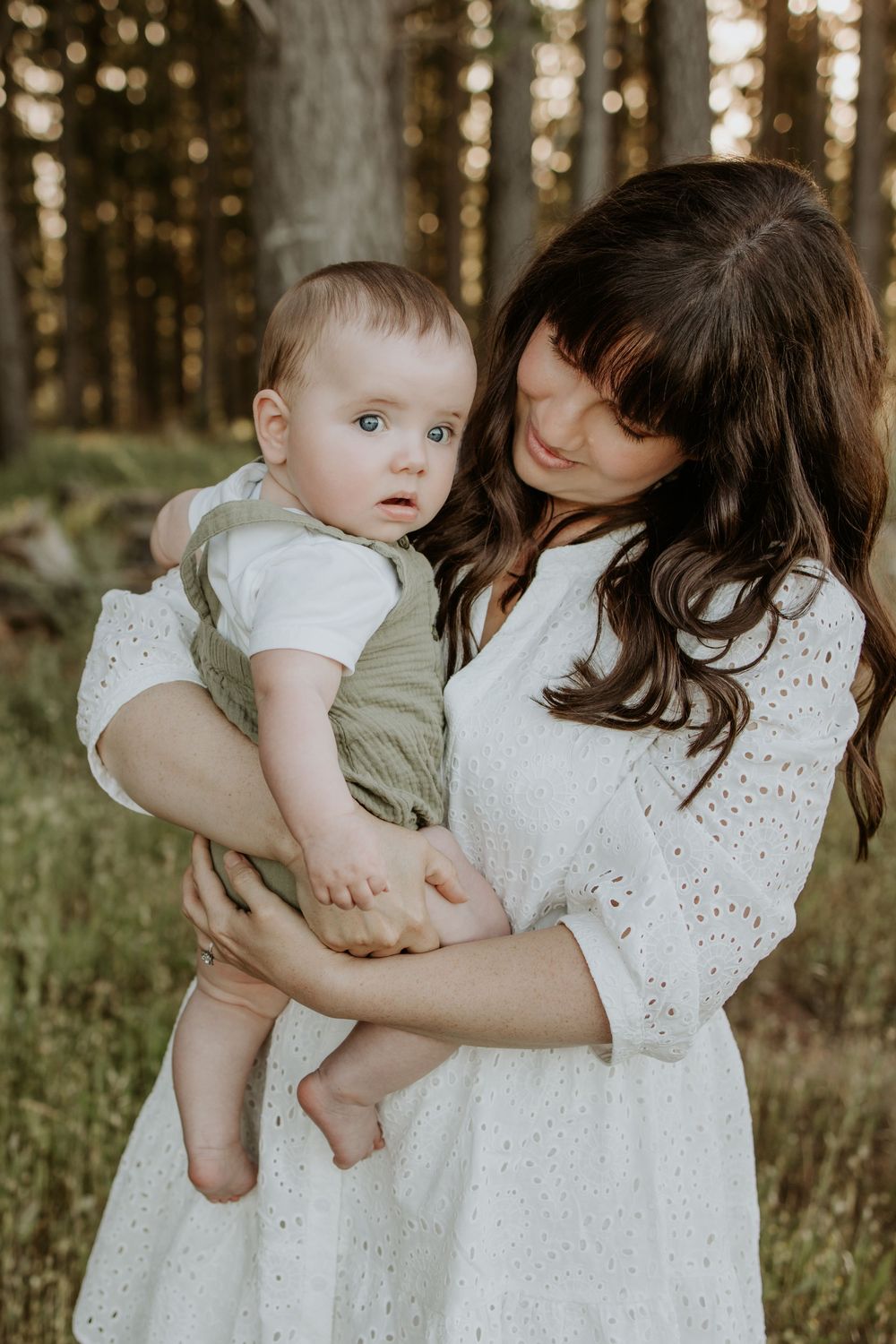 Adelaide family photographer - mother cuddling son in the Kuitpo forest