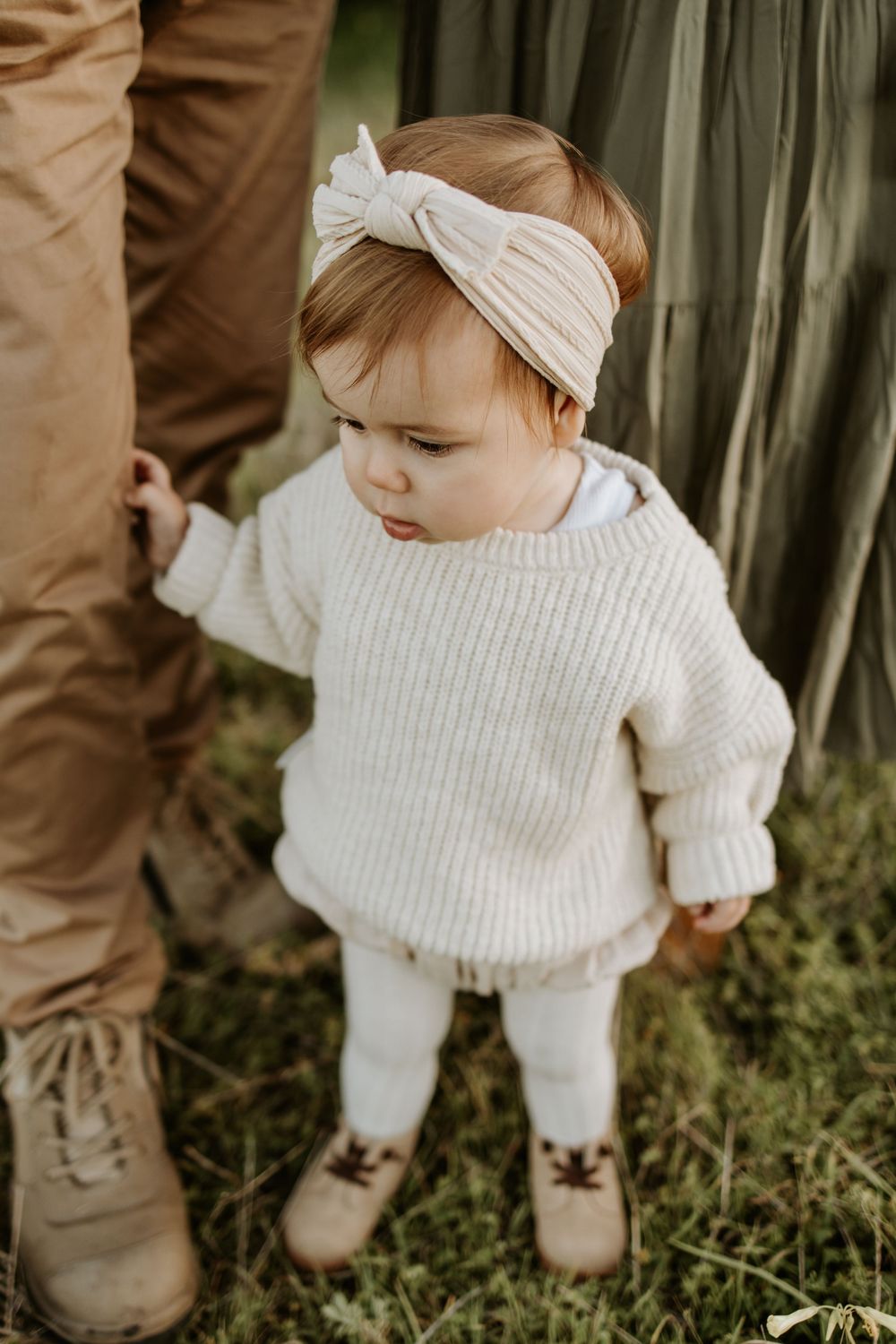 Adelaide family photographer - granddaughter standing with grandparents