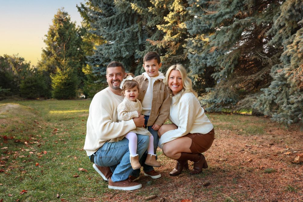 Family photographed squatting in a park in New Castle New Hampshire