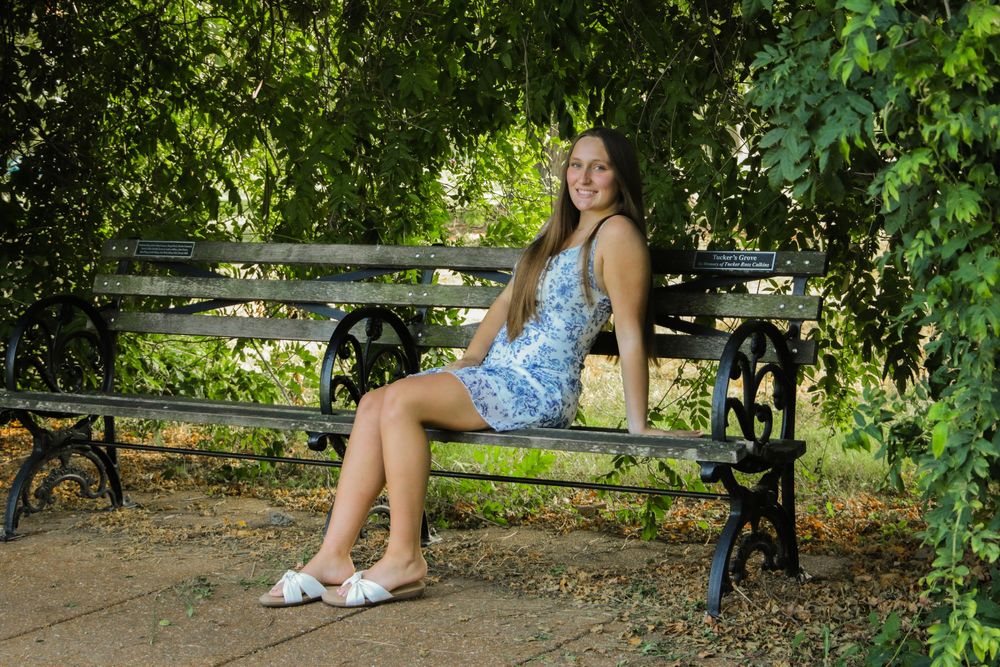 Senior girl sitting on bench