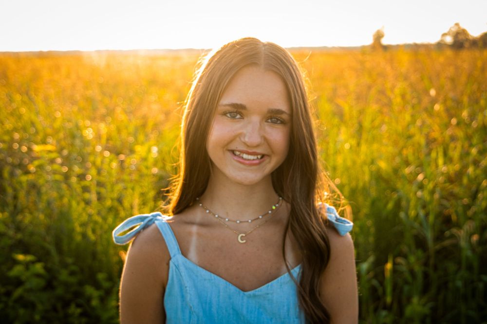 Portrait in a sunflower field