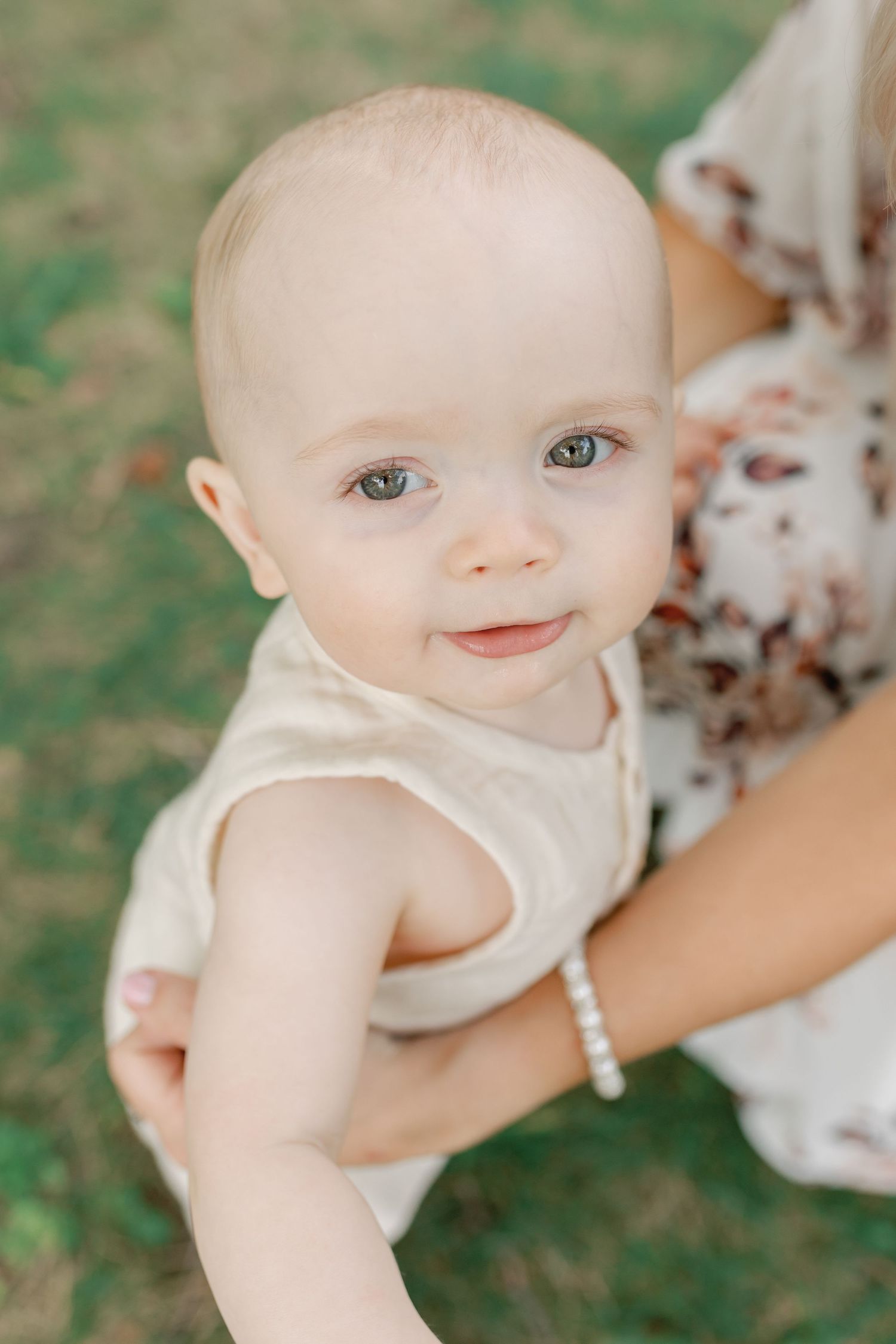 Adorable 1-year-old with big blue eyes in a 'Mommy and Me' outdoor session at High Park by Katie Crane Photography.