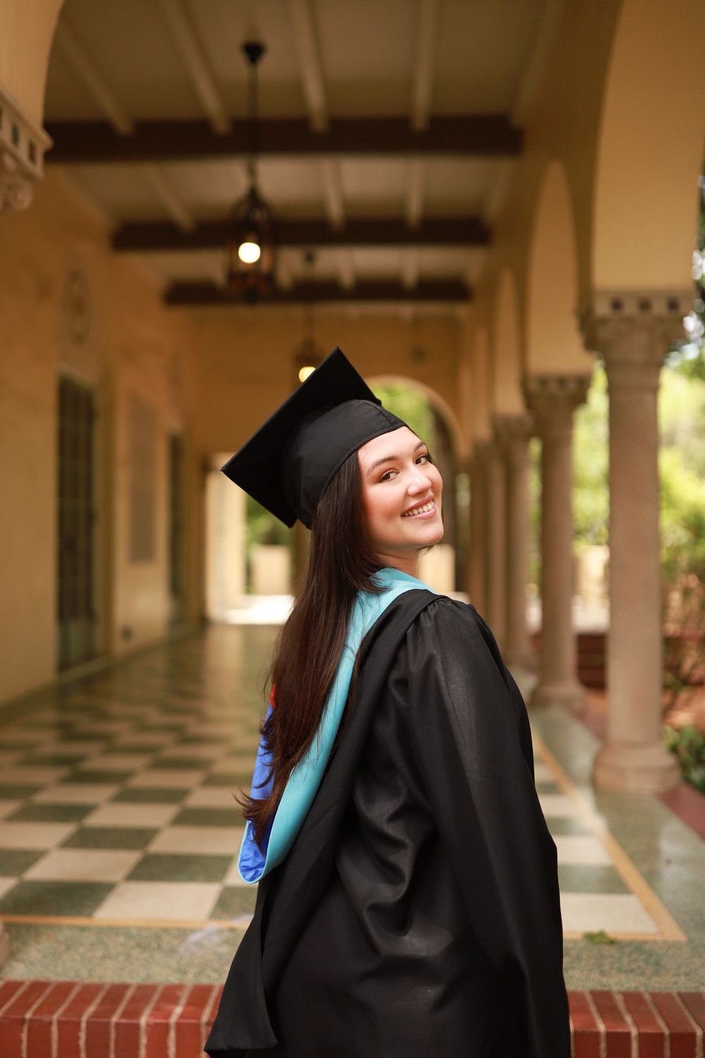 Graduation portrait with cap and gown