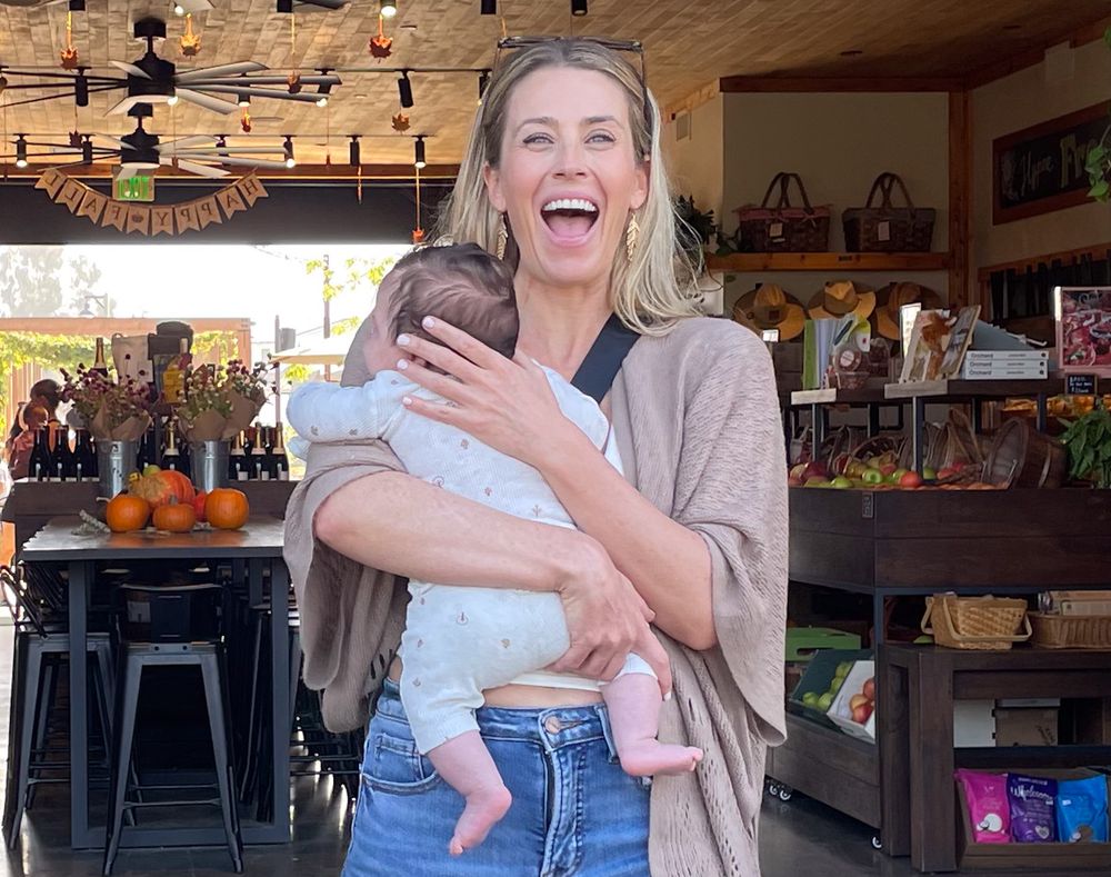 A collage of moments showing someone holding a baby in various casual indoor and outdoor settings.