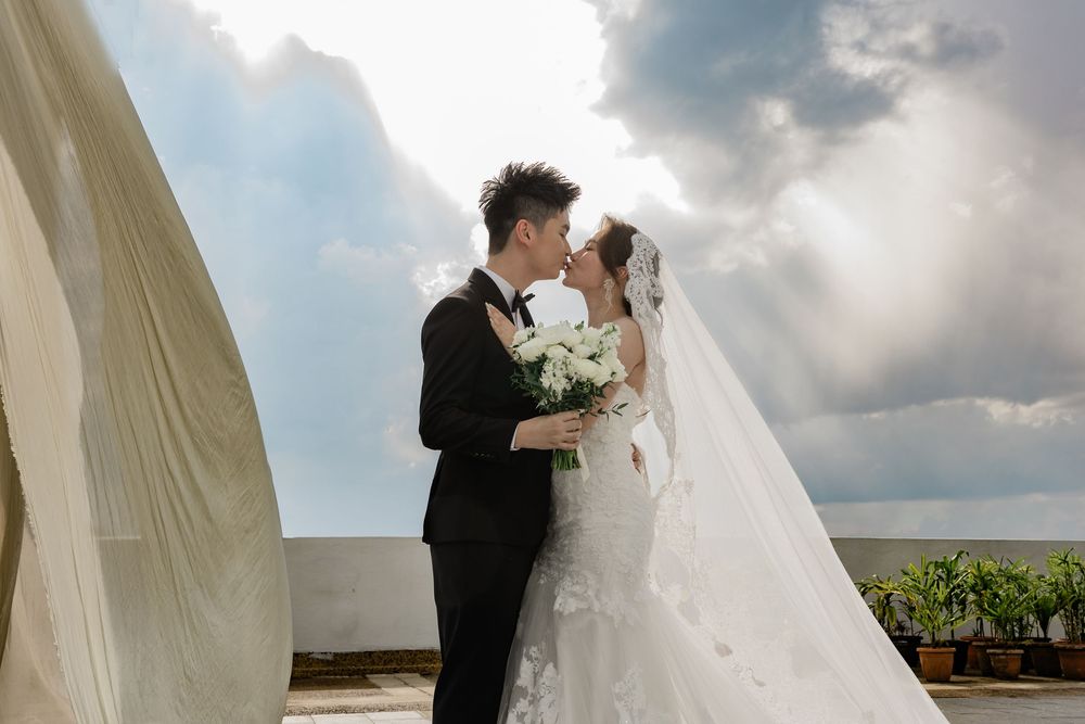 Bride and groom outdoor garden ceremony at RH hotel, Sibu, Sarawak