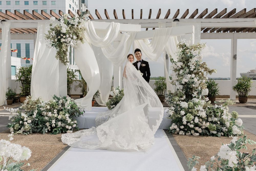 Bride and groom outdoor garden ceremony at RH hotel, Sibu, Sarawak
