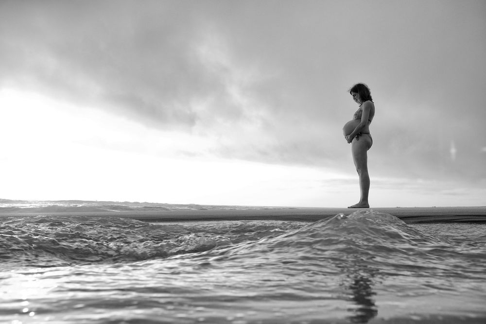 Sessão fotográfica de grávida na praia