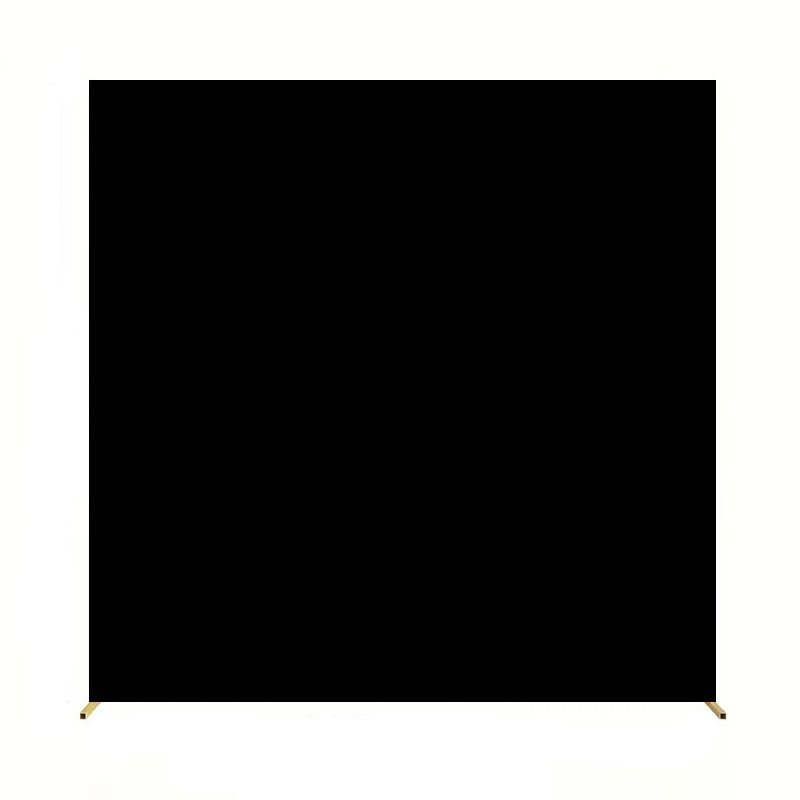 Square black backdrop with gold stand visible at bottom.