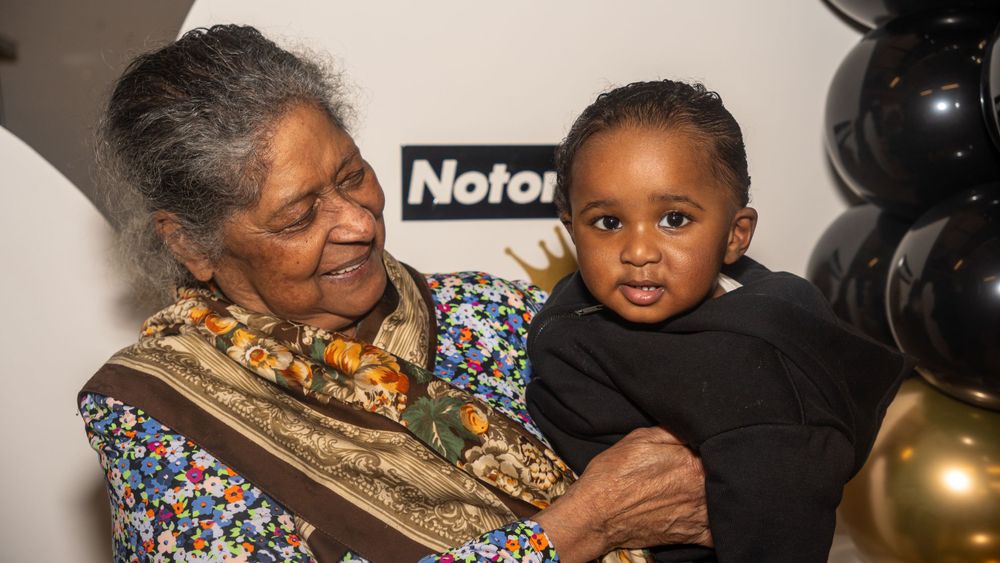 grandma carry her grandson