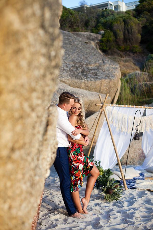 engagement photshoot of young couple on melbourne beach