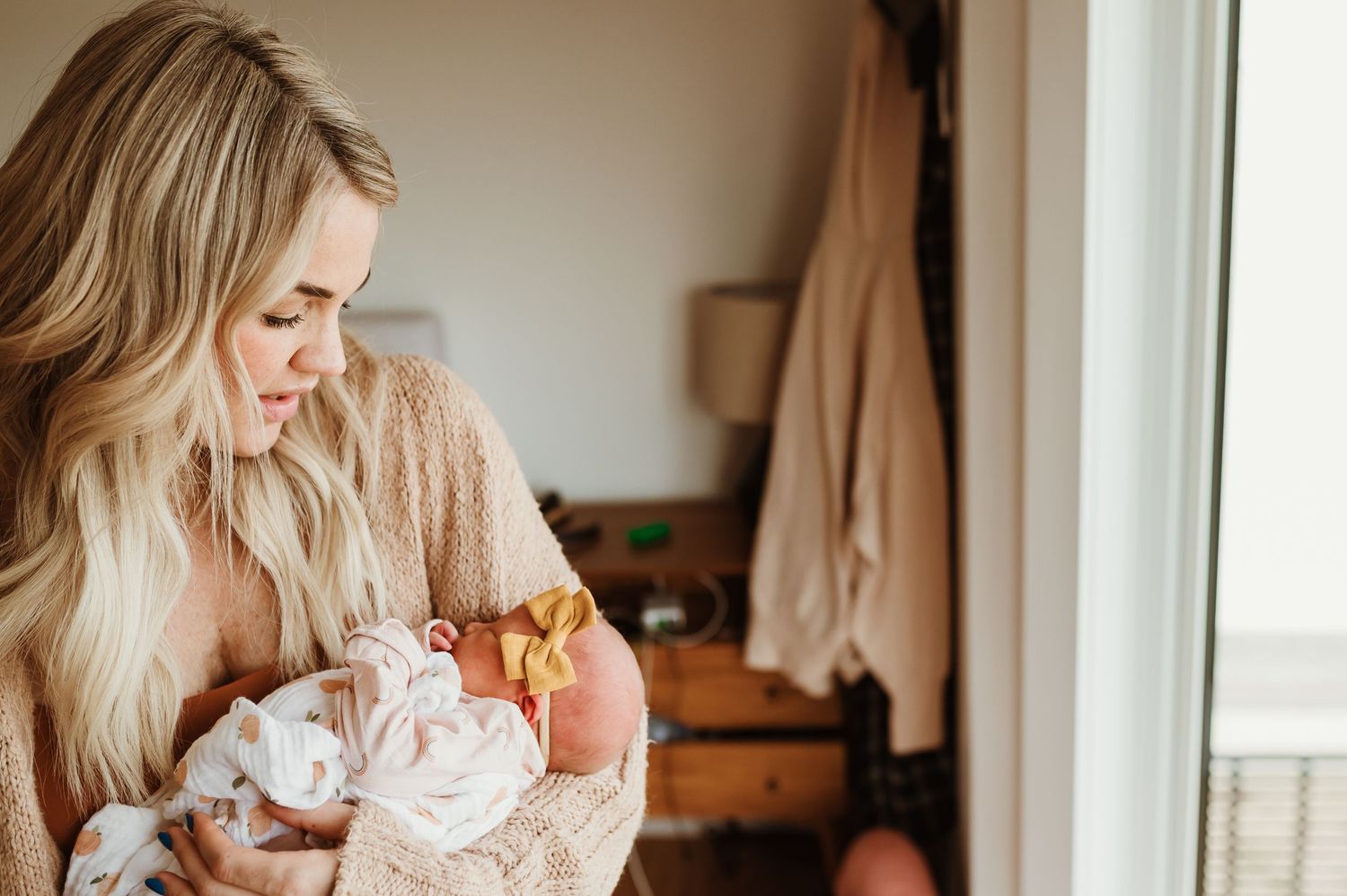 newborn home session mother with baby