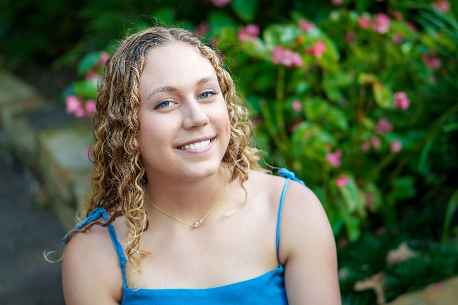 senior photos 2025 class field North Richland Hills Texas white dress outfit fall season blonde girl white wild flowers