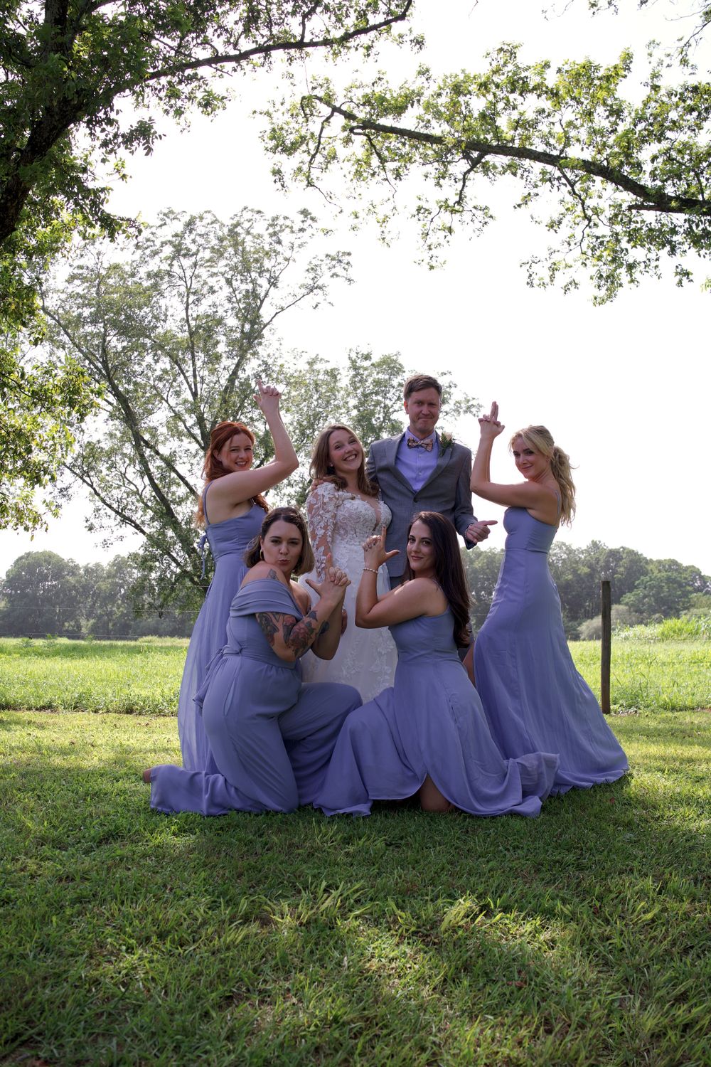 Bride, groom, and wedding party pose in Griffin, Georgia