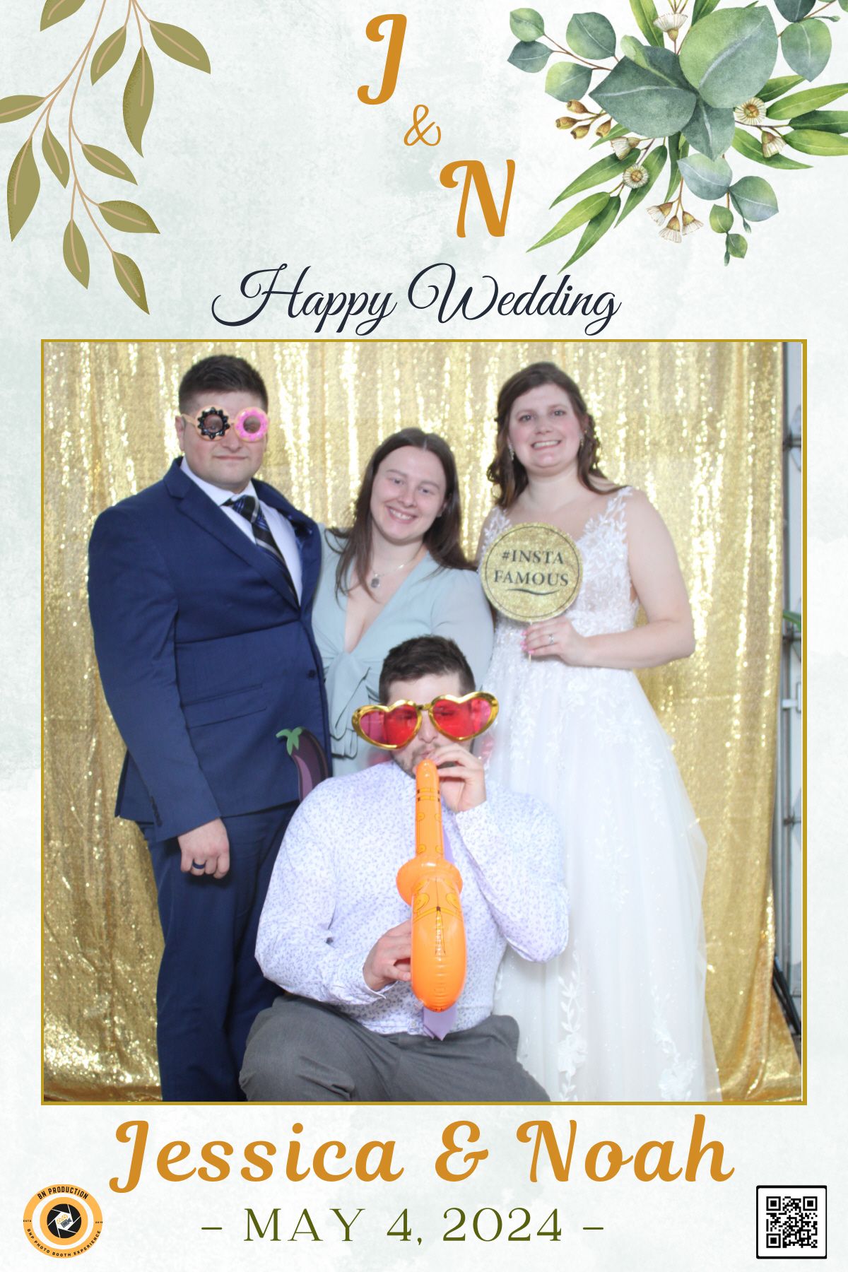 Wedding photo booth picture with gold and greenery frame design.
