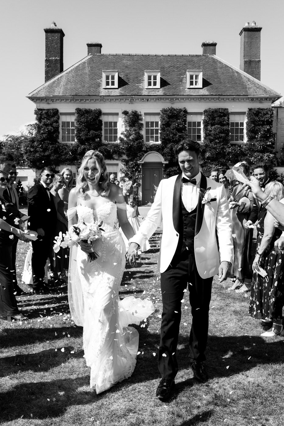 Gileston manor wedding couple confetti aisle