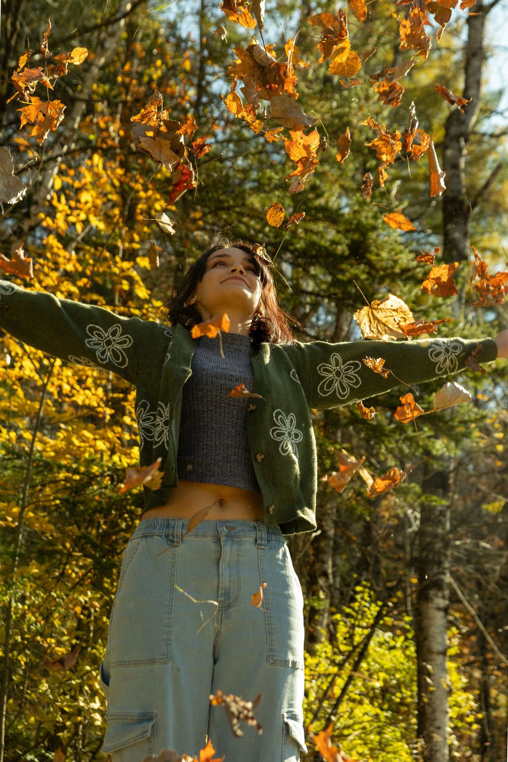 "Stunning Senior Portraits captured in Vermont, showcasing a vibrant outdoor setting and natural light."