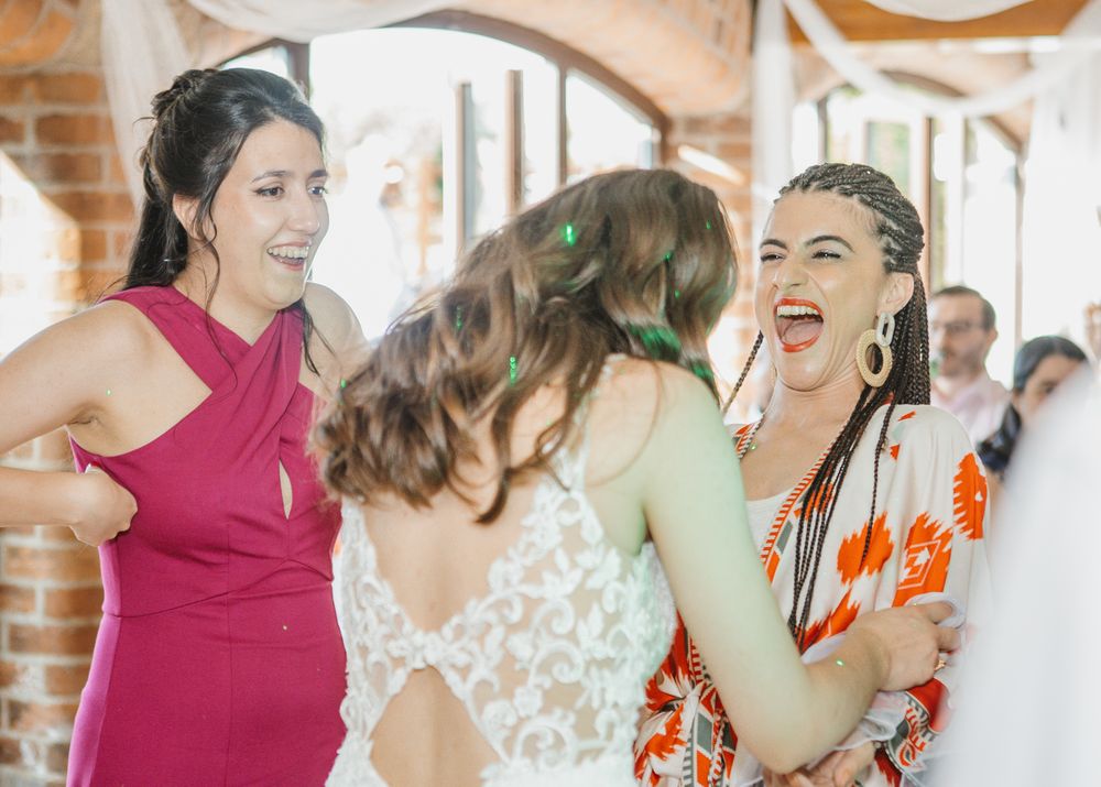 Reaction of girl laughing at an event.