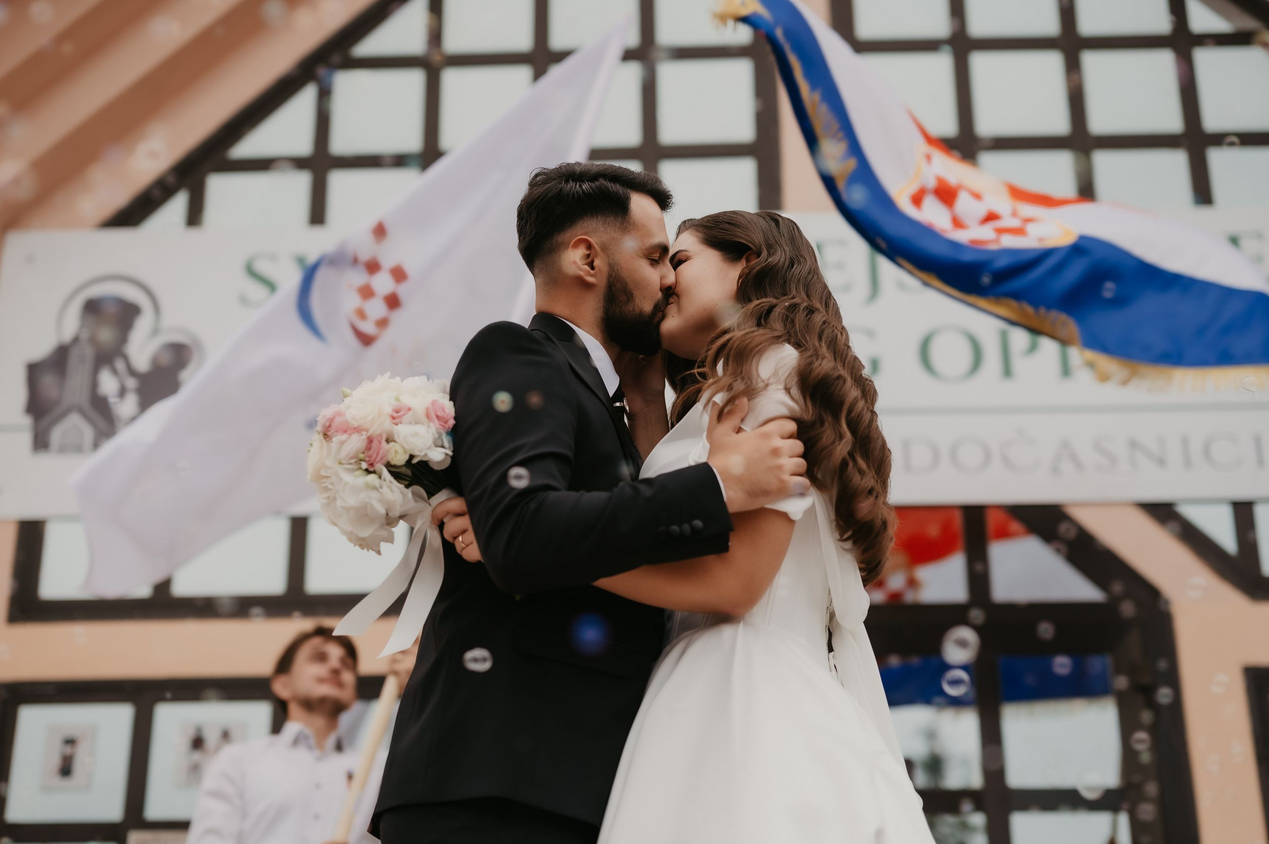 A collection of romantic wedding photos showing couples embracing and sharing intimate moments.