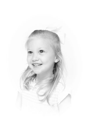 High-key portraits capturing ethereal expressions against white background.