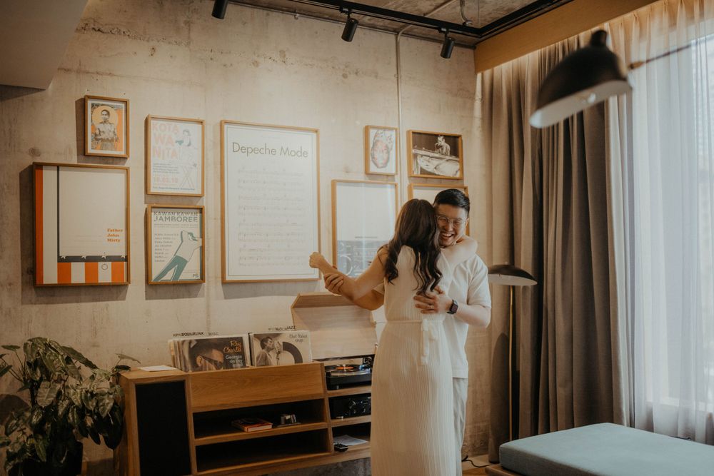 Couple dancing during post-wedding portrait at Kloe Hotel, Kuala Lumpur