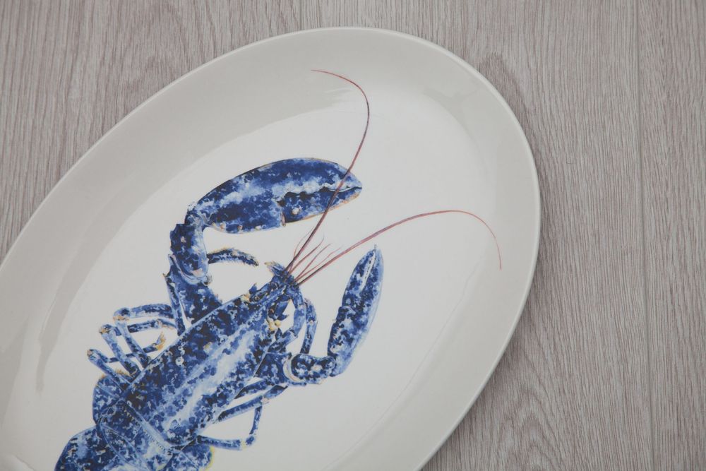 Hand painted lobster design on a white oval platter