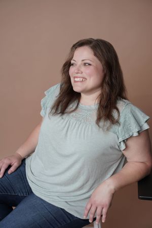 headshot of woman laughing